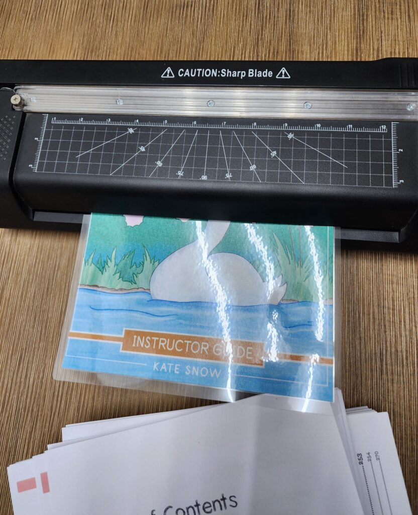 Printing and binding. 2-in-1 laminator and paper cutter.