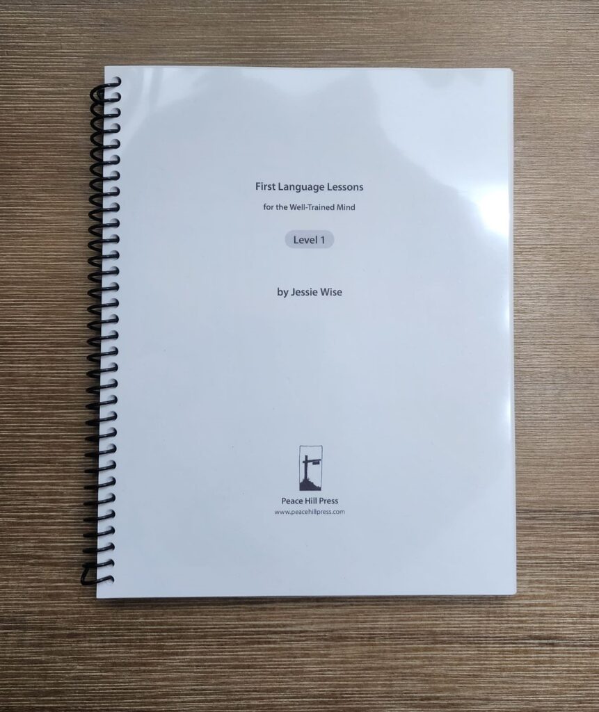 First Language Lessons for the Well-Trained Mind Level 1 printed and bound using a clear presentation cover, 60lb cardstock cover, and kraft chipboard for back.